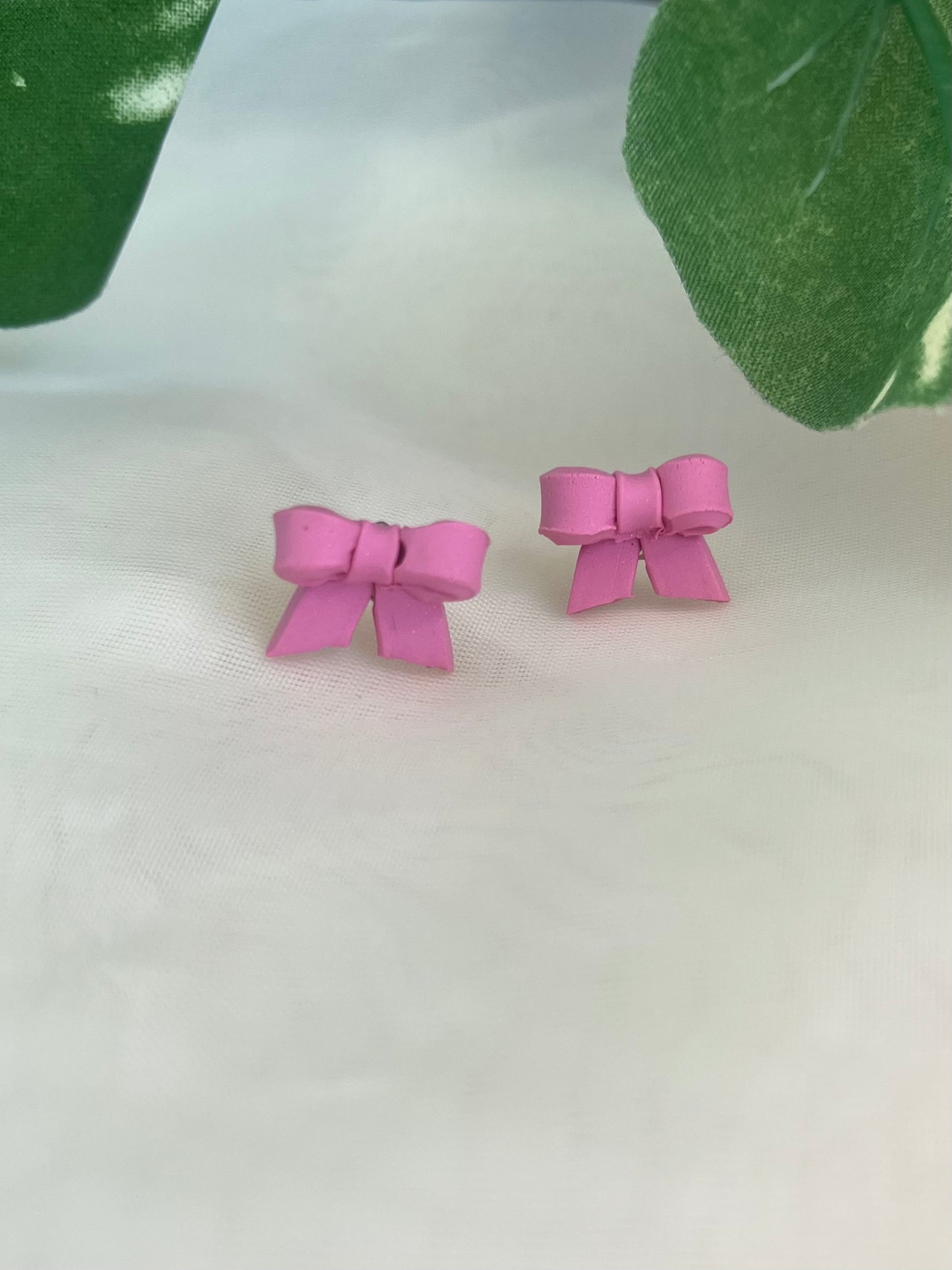 Pink bow studs
