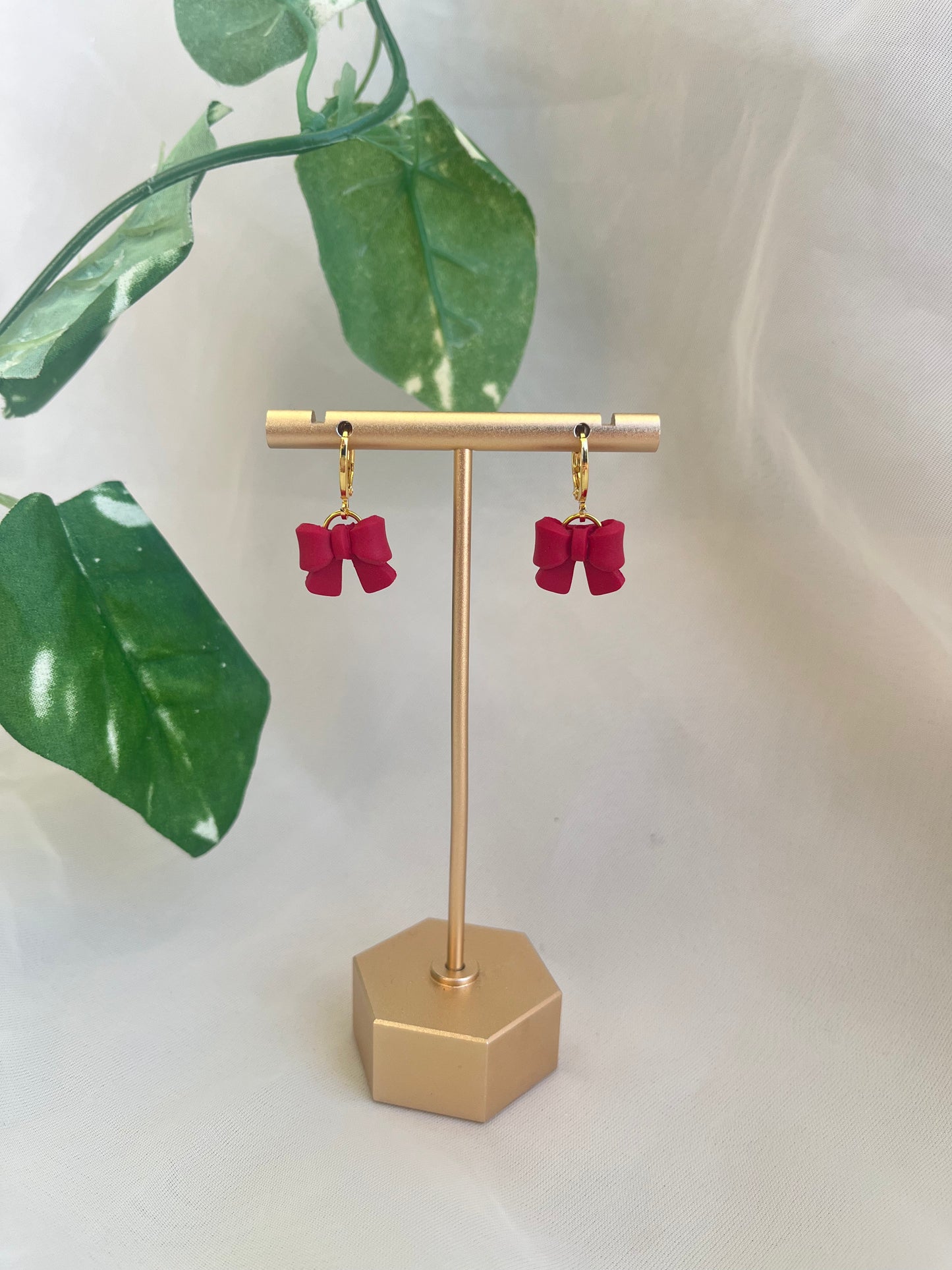 red bow earrings