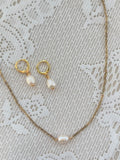Pearly girl set in gold
