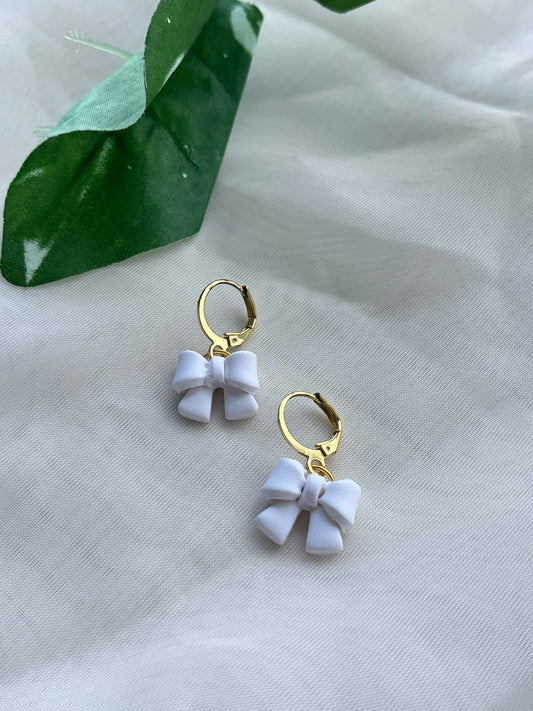 white bow earrings