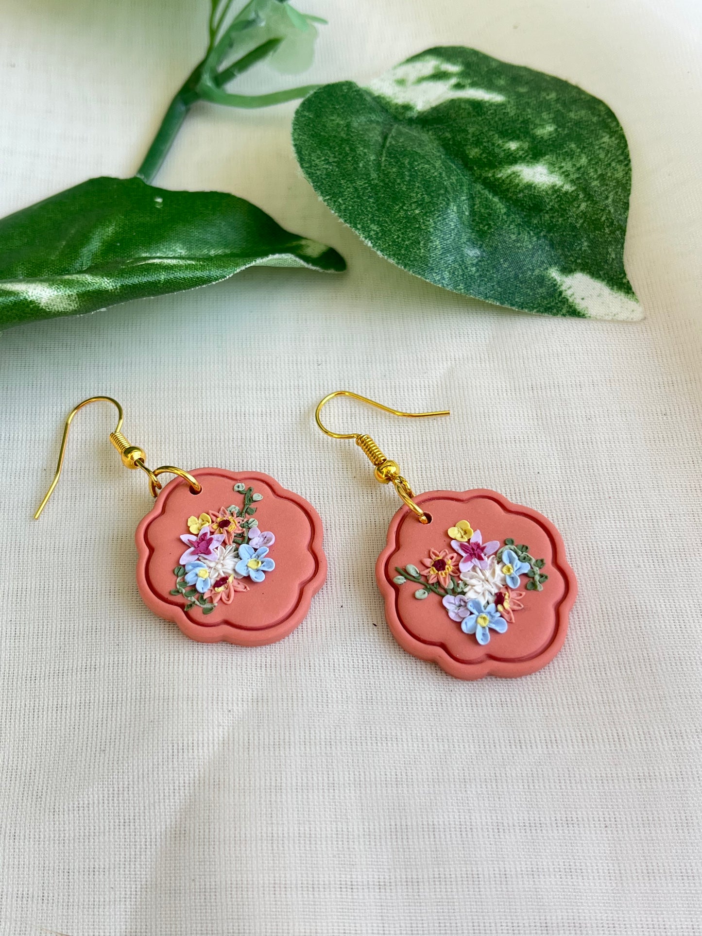 Floral pendant earrings